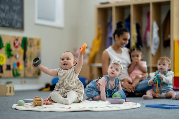 Children participating in an illustrative infants activity