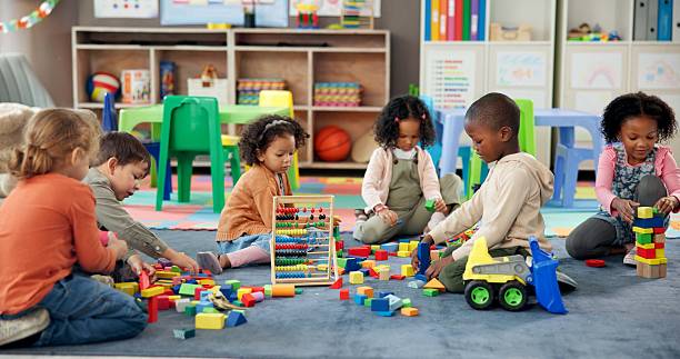 Children participating in an illustrative pre-k activity