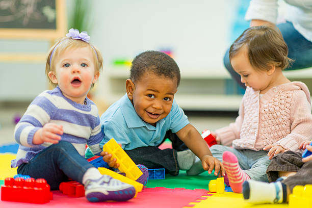 Children participating in an illustrative toddlers activity